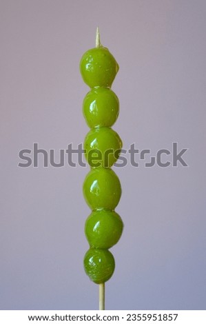Tanghulu, a fruit skewer Korean snack candy coated with sugar syrup Royalty-Free Stock Photo #2355951857