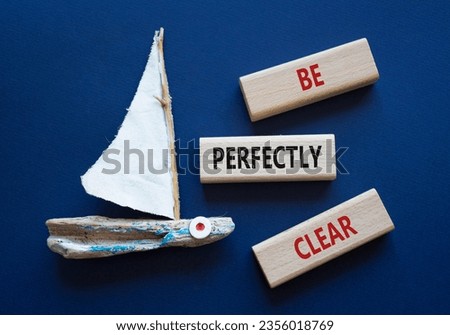 Be perfectly clear symbol. Concept words Be perfectlyclear on wooden blocks. Beautiful deep blue background with boat. Business and Be perfectly clear concept. Copy space Royalty-Free Stock Photo #2356018769