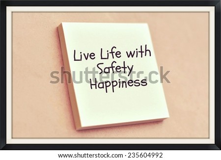 Text live life with safety happiness on the short note texture background