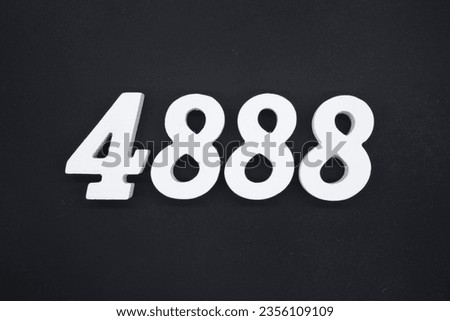 Black for the background. The number 4888 is made of white painted wood.