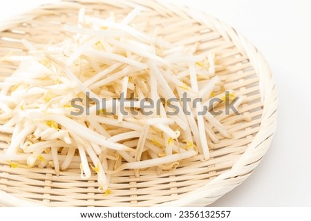 Bean sprouts on a white background.