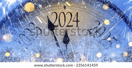 Countdown to midnight. Retro style clock counting last moments before Christmas or New Year 2024