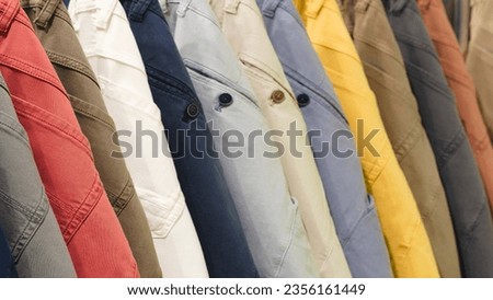 multicolored cotton trousers in the market Royalty-Free Stock Photo #2356161449