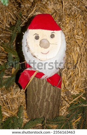 Grandfather frost from common polen. Symbol of New Year's holidays from wood