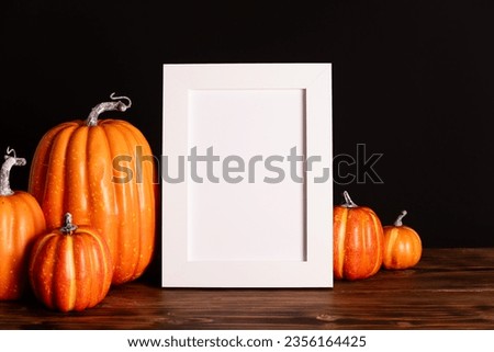 Happy Halloween frame mockup template with pumpkins in the background