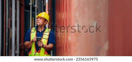 Industrial Engineer checking inventory or task details at Container cargo harbor. Logistics Expert Overseeing Shipping and Distribution Operations.