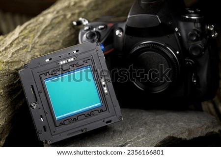 Capturing Perfection: 4K Close-Up of Digital Camera Sensor on Stone