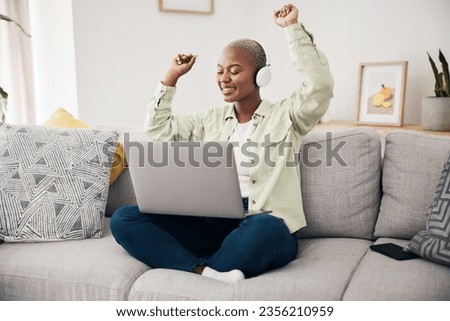 Music, dance and black woman with laptop on sofa with headphones, happy and free at home. Radio, earphones and African female dancing to online feel good podcast in living room smile for subscription