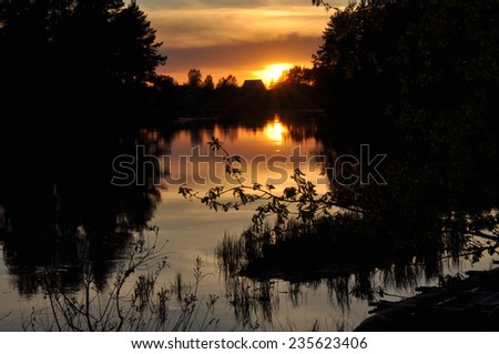 Sunset on a quiet river. May the landscape of the national Park "Meshera", Russia.