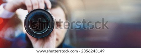Photographer and photo shooting in the street
