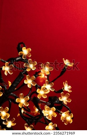macro of a golden flower with a red background - christmas ornaments