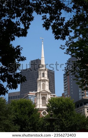 View of Park Street Church from a distance, framed by Foliage of trees, Boston, Massachusetts, USA 