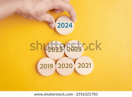 Planning New year in 2024. putting wood block to countdown merry christmas and happy new year, Planning and challenge strategy in new year 2024 Concept