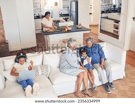 Big family, above and with technology in the living room with grandparents for cartoon or gaming. Happy, love and children on the sofa with a senior man and woman and a laptop or tablet for streaming