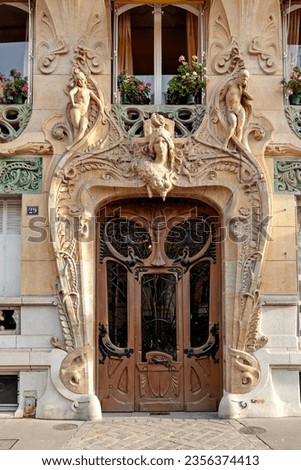 Door entrance of the famous Lavirotte Building, an apartment building in the 7th arrondissement of Paris, France, designed by Jules Lavirotte, one of the best-known surviving examples of Art Nouveau. Royalty-Free Stock Photo #2356374413