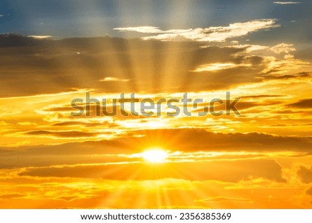 Sunset sky dramatic sunset clouds and sunset sunrays Royalty-Free Stock Photo #2356385369