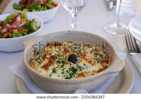 bacalhau com nata, codfish with cream , traditional plate in Portugal