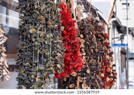 Hanging dried vegetables. It is dried by sun drying, which is the traditional drying method. Royalty-Free Stock Photo #2356387919