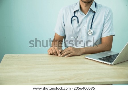 Smart medicine doctors working with computer notebook and digital tablet  at desk in the hospital. Medical concept.Medical teamwork discussion