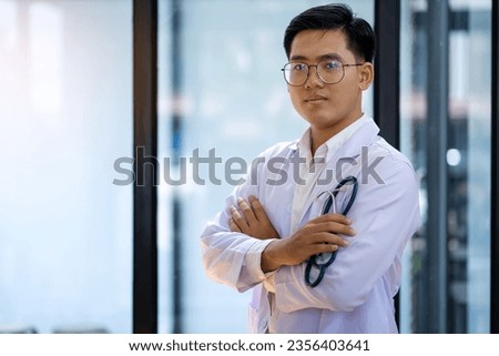 Doctor with stethoscope in hand at hospital, medical and healthcare concept