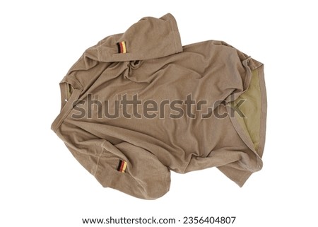Crumpled Brown German Armed Forces T-Shirt On White Background With German Flag Patch, Bundeswehr T-Shirt, German Army T-Shirt, Shirt German Army, Military Shirt, Military T-Shirt, Camouflage Shirt Royalty-Free Stock Photo #2356404807