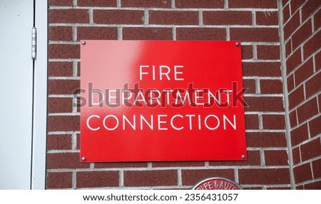 fire department sign guides the way to the fire exit, a vital symbol of safety, escape, and emergency preparedness