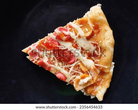 A slice of pizza on plate