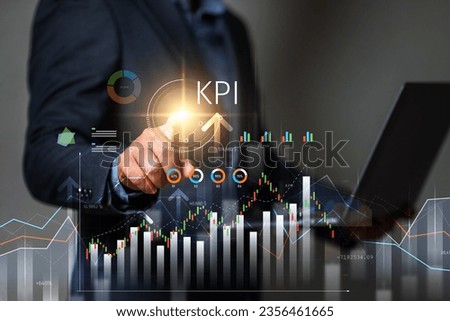 key performance indicator KPI concept, Businessman working with key performance indicator (KPI) tools on virtual screen. Royalty-Free Stock Photo #2356461665