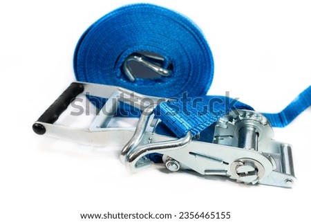 Blue, new  ratchet strap close up shot, isolated on white background. Royalty-Free Stock Photo #2356465155