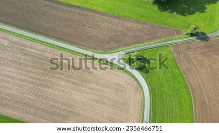 fork in the road drone view at the crossroads Royalty-Free Stock Photo #2356466751