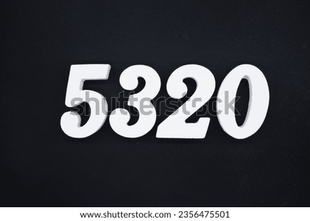 Black for the background. The number 5320 is made of white painted wood.
