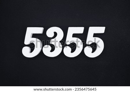 Black for the background. The number 5355 is made of white painted wood.