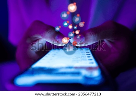 Young woman using smartphone, concept social media marketing