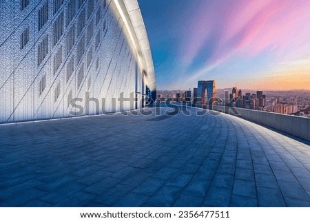Empty floor and modern city skyline with building at sunset in Suzhou, Jiangsu Province, China. high angle view. Royalty-Free Stock Photo #2356477511