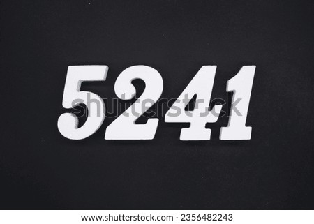 Black for the background. The number 5241 is made of white painted wood.