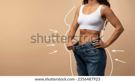 Before and after weight loss concept. Cropped of slender well-fit athletic middle eastern woman wearing white top and oversize jeans, showing thin waist, white shape lines of chubby lady, copy space Royalty-Free Stock Photo #2356487923