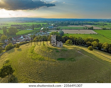 Drone view of Burrow Mump which is situated on the Somerset levels. Royalty-Free Stock Photo #2356491307