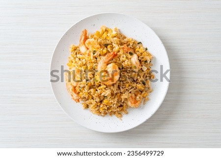 homemade fried shrimps fried rice on plate in Thai style - Asian food style Royalty-Free Stock Photo #2356499729