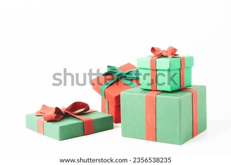 Present. Gift box with a bow. New Year's surprise. Red and green box with a gift