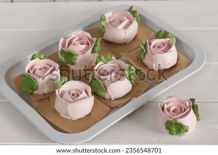 Homemade marshmallows. Zephyr flowers. On the tray. On white boards. Royalty-Free Stock Photo #2356548701