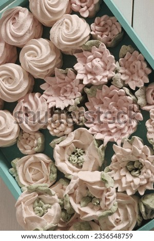 Homemade marshmallows on the tray. Zephyr flowers. Close-up. View from above. Royalty-Free Stock Photo #2356548759