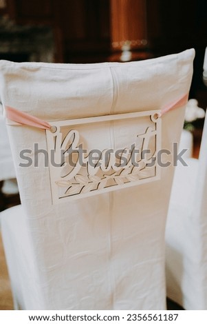 Bride and groom chairs on wedding matrimony, wedding chair decoration details