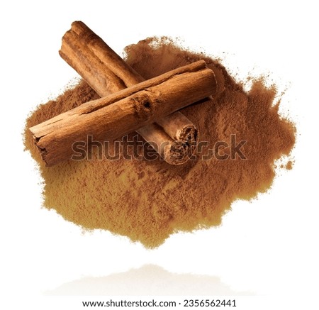 Fresh dried raw Cinnamon stick falling in the air isolated on white backround. Food spices levitation or zero gravity conception. High resolution image.