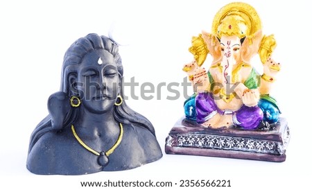 Indian God idol or statue isolated on white. Maa laxmi with Lord Ganesha, Adiyogi, Godess Durga on lion and Lord krishana Statue.