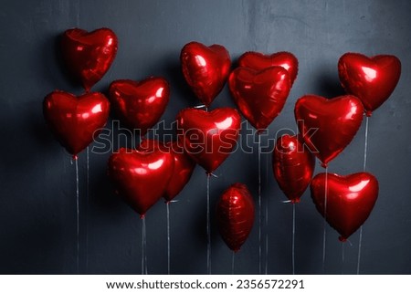 red heart balloons on dark background Royalty-Free Stock Photo #2356572291