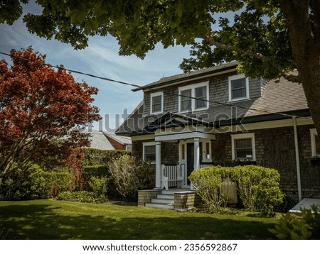 Luxurious home in summer on the island of Martha's Vineyard Royalty-Free Stock Photo #2356592867