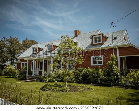 Luxurious home in summer on the island of Martha's Vineyard Royalty-Free Stock Photo #2356592873