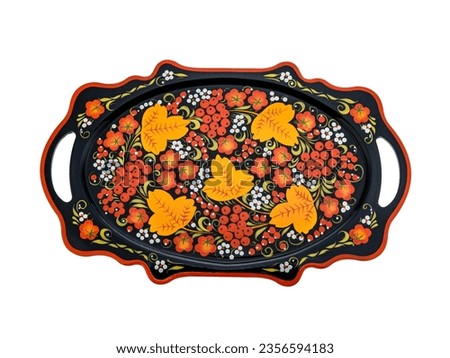 Black Orange Red Green decorative russian folk handpainted metal tray with floral color pattern on white. Use for interior design.
