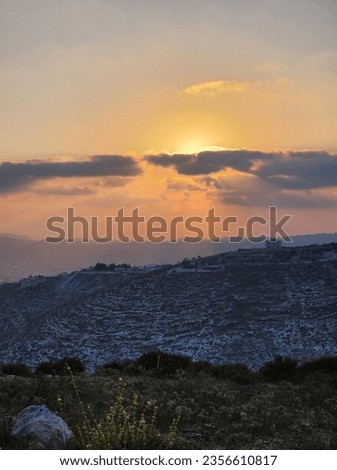 A picture of the sunset view in the sky of Palestine