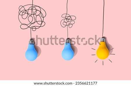 Clarifying complex ideas through the glow of lightbulbs - Flat lay Royalty-Free Stock Photo #2356621177